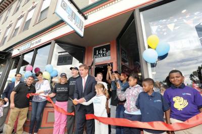 Mayor Walsh and friends cut the ribbon outside Chill on Park, a new cafe and restaurant in Fields Corner. 	Photos by Don Harney/Mayor’s Office